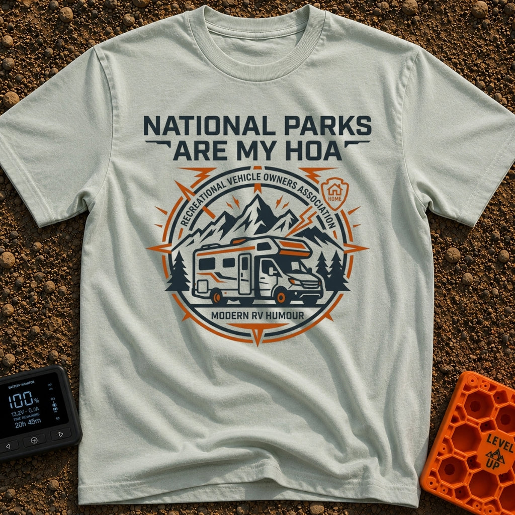 Parks Are My HOA - T-Shirt in Bay - A graphic emblem featuring a Class C motorhome parked in front of mountains and pine...