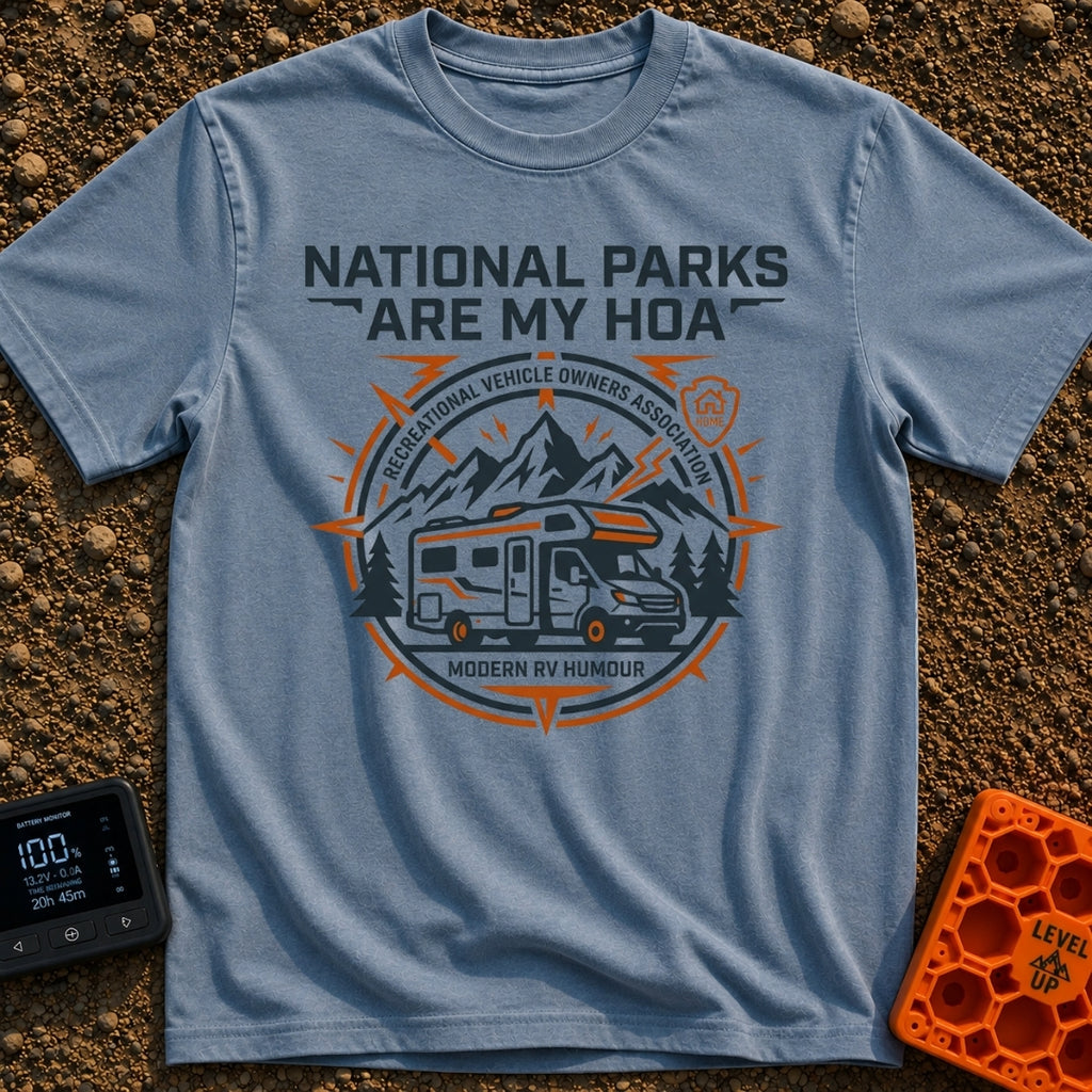 Parks Are My HOA - T-Shirt in Blue Jean - A graphic emblem featuring a Class C motorhome parked in front of mountains and...