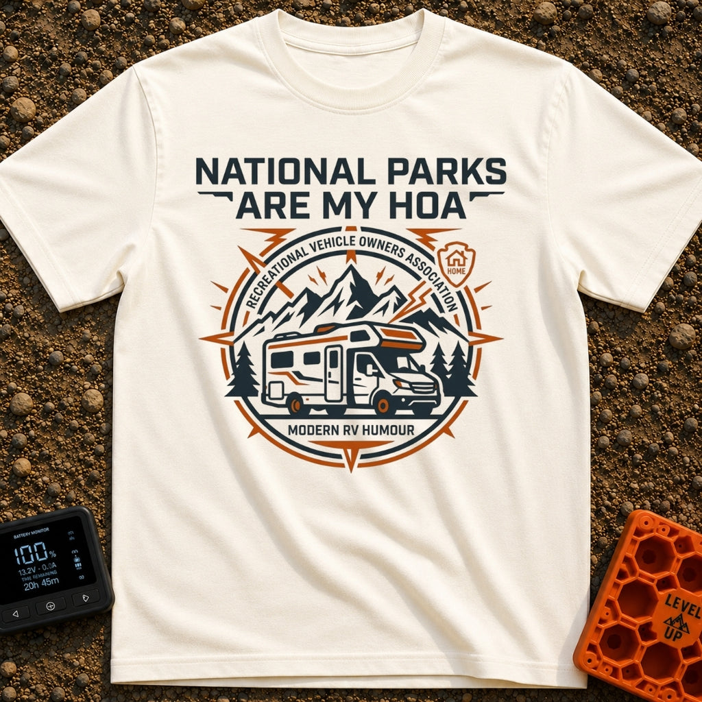 Parks Are My HOA - T-Shirt in Ivory - A graphic emblem featuring a Class C motorhome parked in front of mountains and...