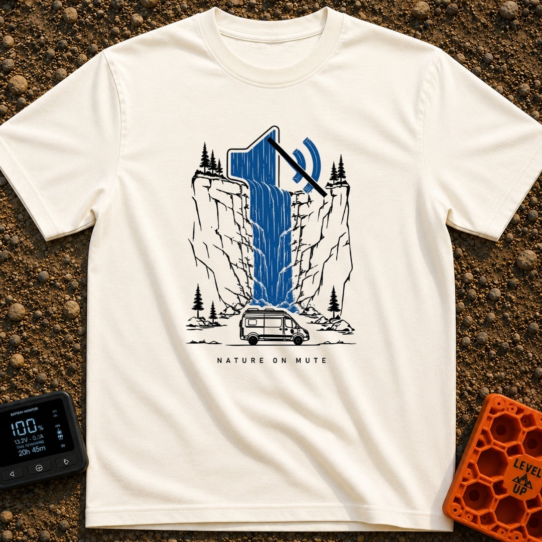 Stream On Mute - T-Shirt in Ivory - An illustration of a camper van parked at the base of a steep cliff with pine trees,...