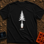 Nature's Port Of Call - T-Shirt in Black - A black and white line drawing of a pine tree where the lower trunk transforms...