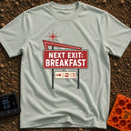 Breakfast Next Exit - T-Shirt in Bay - A vintage-style roadside sign with a red starburst and arrow, featuring a large...