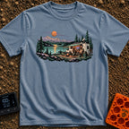 Room With A View - T-Shirt in Blue Jean - A white RV with an open side, solar panels, and a satellite dish is parked by a...