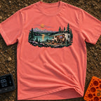 Room With A View - T-Shirt in Watermelon - A white RV with an open side, solar panels, and a satellite dish is parked by...