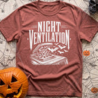 Crack A Window - T-Shirt in Brick - A white, distressed-style line drawing of an open campervan roof vent fan with a...