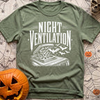 Crack A Window - T-Shirt in Moss - A white, distressed-style line drawing of an open campervan roof vent fan with a swarm...