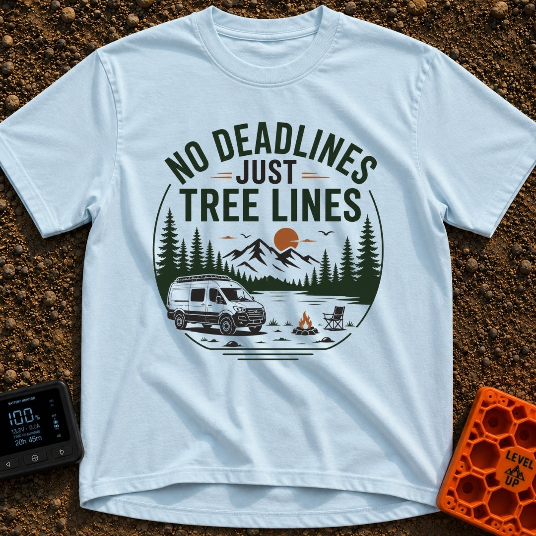 Tree Lines Over Deadlines - T-Shirt in Chambray - A circular badge illustration showing a campervan parked near a...