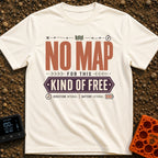 No Map Just Free - T-Shirt in Ivory - A typographic design featuring the large text "NO MAP" in brown, with "KIND OF...