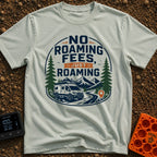 No Fees Just Roaming - T-Shirt in Bay - A graphic illustration of a white camper van parked next to a winding road,...