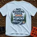 No Fees Just Roaming - T-Shirt in Chambray - A graphic illustration of a white camper van parked next to a winding road,...