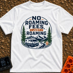 No Fees Just Roaming - T-Shirt in White - A graphic illustration of a white camper van parked next to a winding road,...
