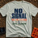 Instinct Meets Loyal Shadow - T-Shirt in Bay - A typographic design featuring the text "NO SIGNAL" next to a low cellular...