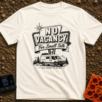 Sorry No Vacancy - T-Shirt in Ivory - A black and white line-art illustration of a camper van parked in front of pine...