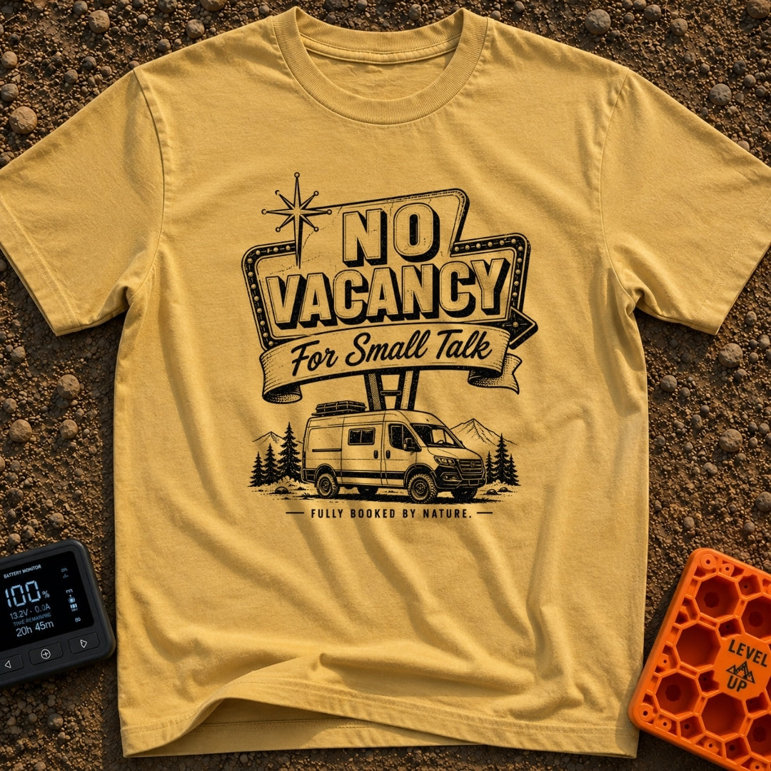 Sorry No Vacancy - T-Shirt in Mustard - A black and white line-art illustration of a camper van parked in front of pine...
