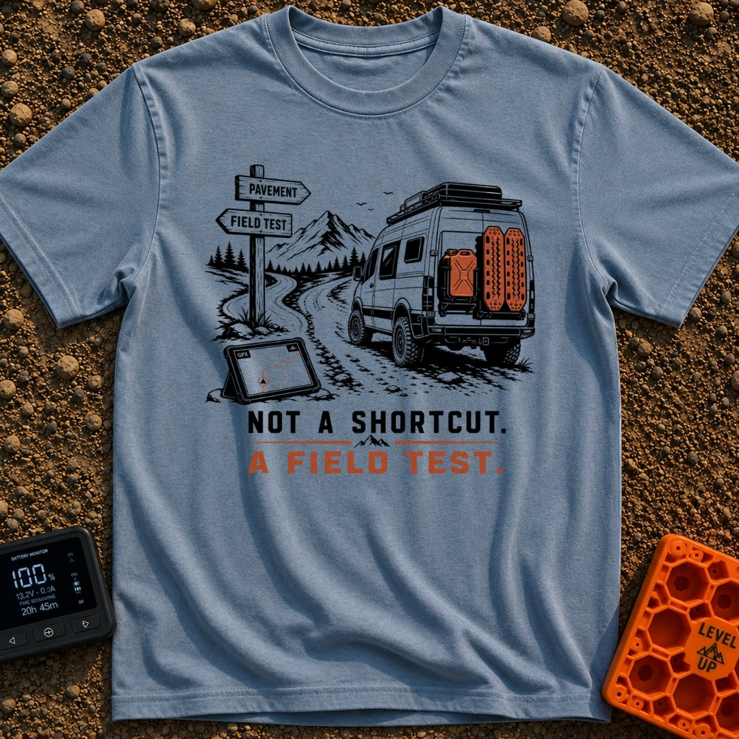 Just A Field Test - T-Shirt in Blue Jean - An illustration of an off-road equipped camper van with recovery boards...