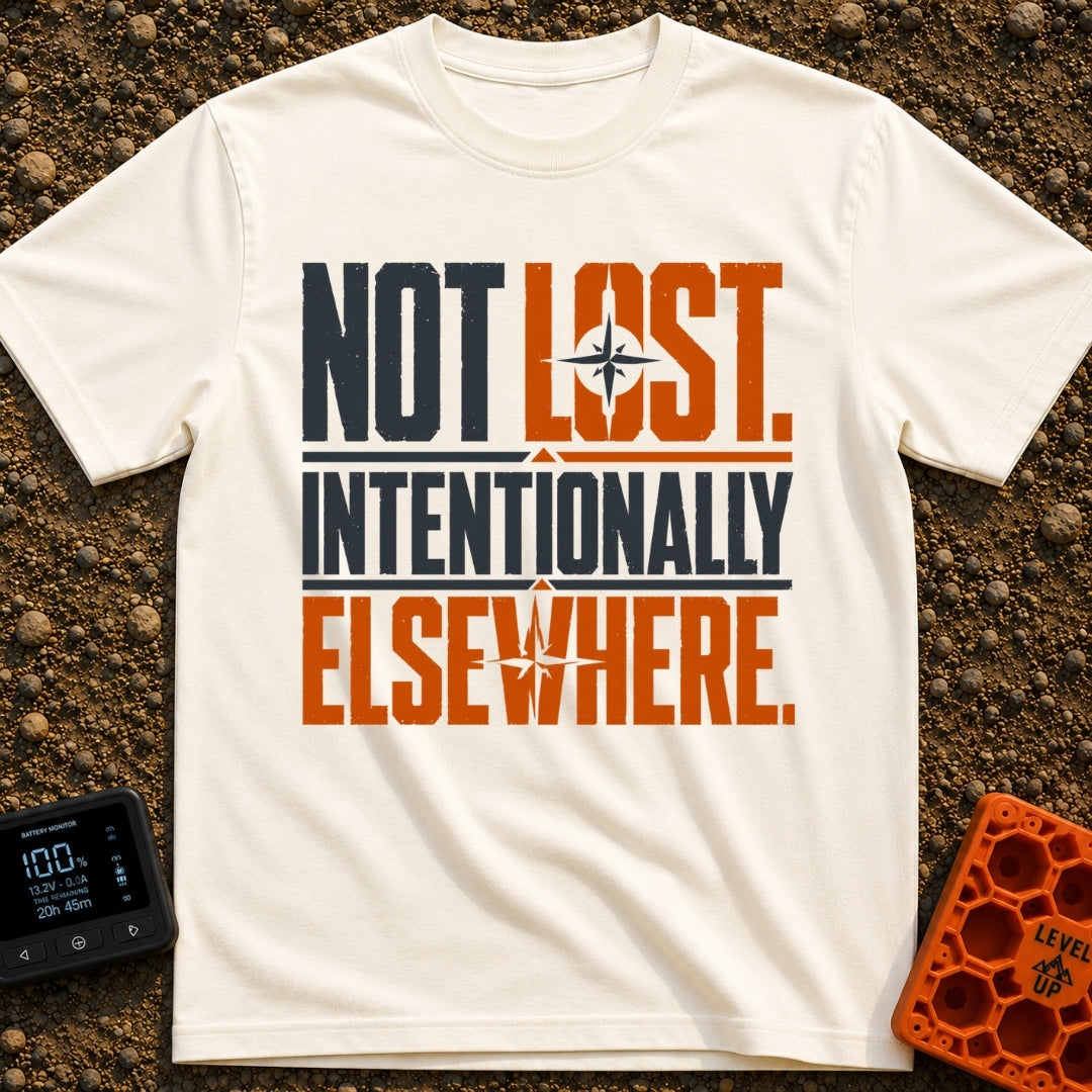 Wander Intentionally Elsewhere - T-Shirt in Ivory - A distressed typography design displaying the phrase "NOT LOST....