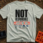 Out of Office Nomad - T-Shirt in Bay - A bold typographic design reading "NOT RESPONSIBLE FOR MISSED MEETINGS" accented...