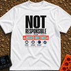 Out of Office Nomad - T-Shirt in White - A bold typographic design reading "NOT RESPONSIBLE FOR MISSED MEETINGS" accented...
