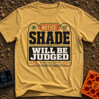 Shade Will Be Judged - T-Shirt in Mustard - A graphic resembling an official notice sign that reads 'NOTICE: SHADE WILL...