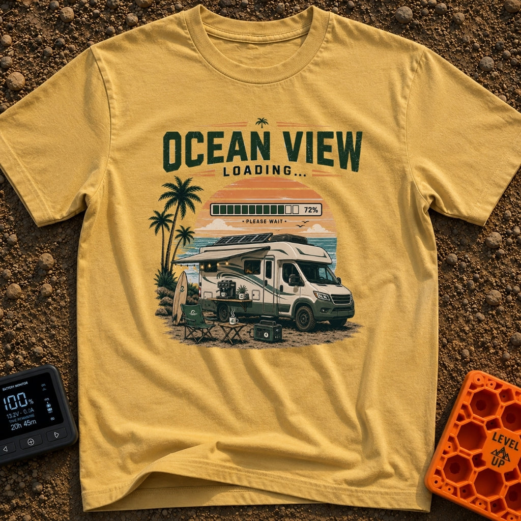 Ocean View Loading - T-Shirt in Mustard - An RV parked by the beach at sunset with its awning extended, featuring...