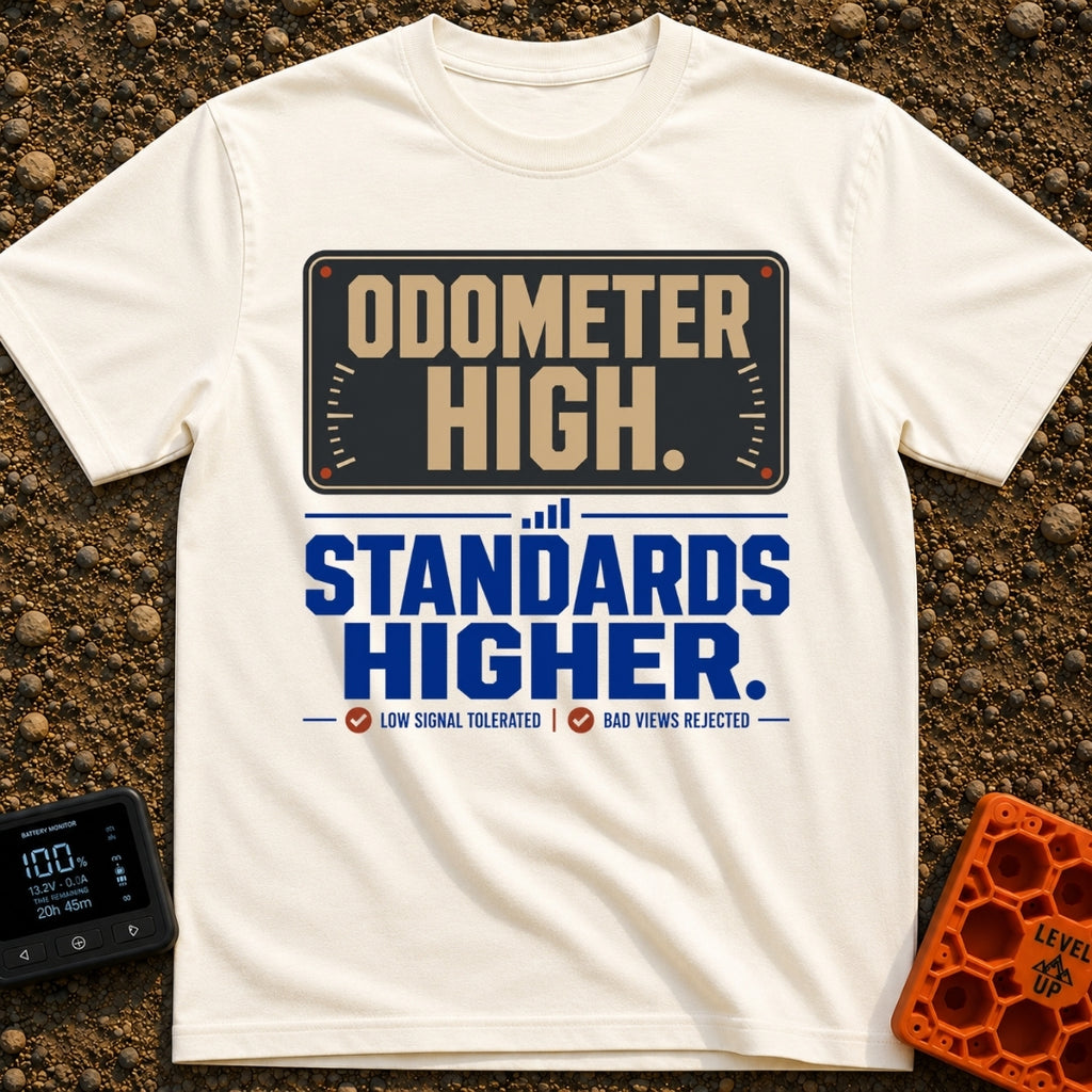 High Miles Higher Standards - T-Shirt in Ivory - A typographic design featuring the text "ODOMETER HIGH." in tan letters...
