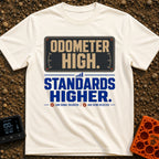 High Miles Higher Standards - T-Shirt in Ivory - A typographic design featuring the text "ODOMETER HIGH." in tan letters...