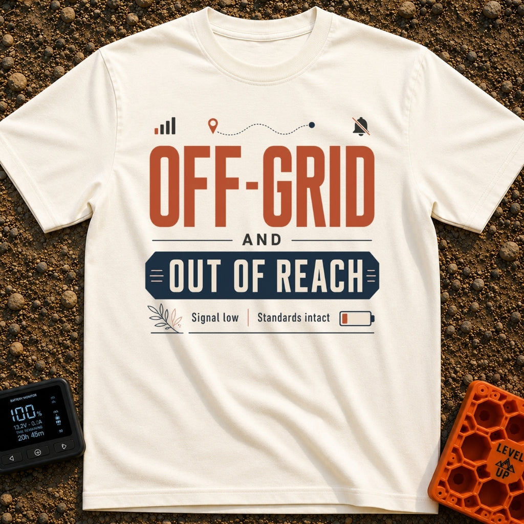 Out Of Reach - T-Shirt in Ivory - A typographic design featuring the text "OFF-GRID AND OUT OF REACH" above the subtitle...