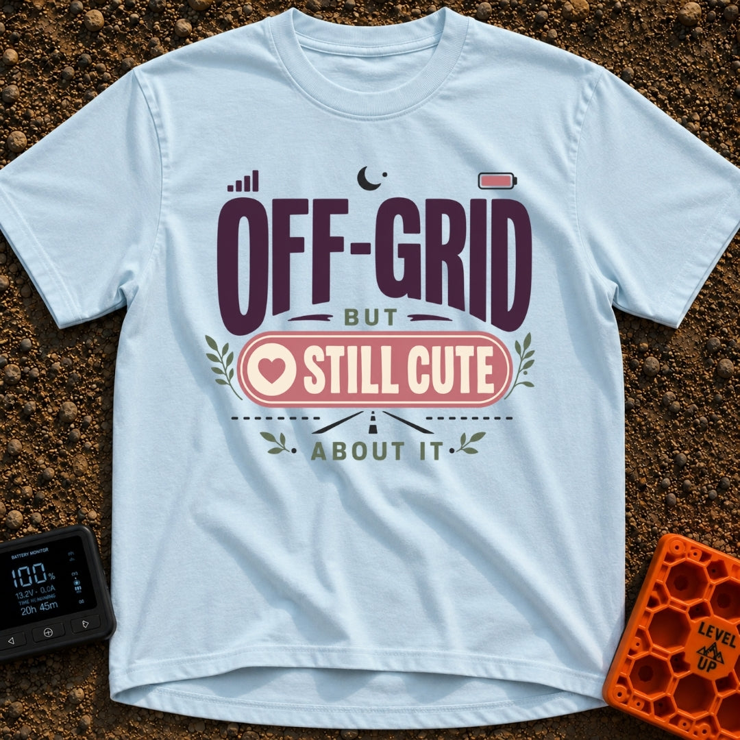 Off Grid But Cute - T-Shirt in Chambray - A typographic design reading "OFF-GRID BUT STILL CUTE ABOUT IT" featuring small...