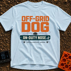Sniffing Off The Grid - T-Shirt in Chambray - A typographic design featuring the text "OFF-GRID DOG" in large orange...