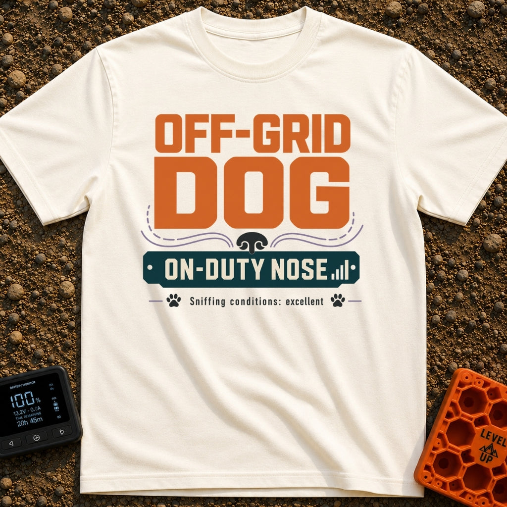 Sniffing Off The Grid - T-Shirt in Ivory - A typographic design featuring the text "OFF-GRID DOG" in large orange letters...