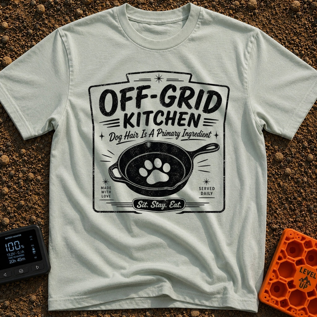 No Reservations Required - T-Shirt in Bay - A black and white graphic featuring a cast iron skillet with a large dog paw...