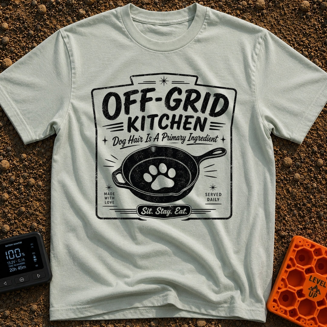 No Reservations Required - T-Shirt in Bay - A black and white graphic featuring a cast iron skillet with a large dog paw...