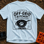 No Reservations Required - T-Shirt in Chambray - A black and white graphic featuring a cast iron skillet with a large dog...