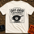 No Reservations Required - T-Shirt in Ivory - A black and white graphic featuring a cast iron skillet with a large dog...