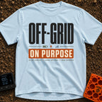 Off Grid On Purpose - T-Shirt in Chambray - A typographic design reading "OFF-GRID" in large text above a battery,...