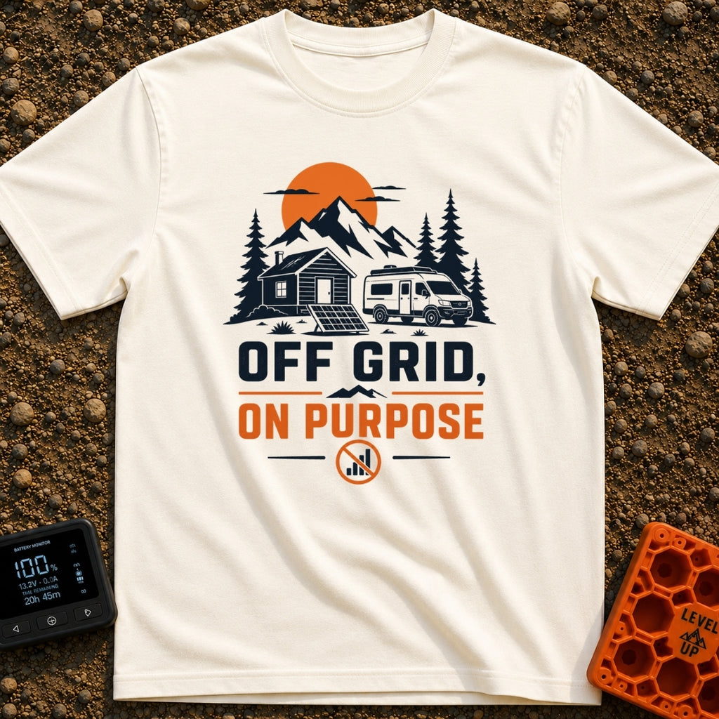 Unplugged On Purpose - T-Shirt in Ivory - An illustration of a camper van and a small cabin nestled in a mountain...
