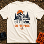 Unplugged On Purpose - T-Shirt in Ivory - An illustration of a camper van and a small cabin nestled in a mountain...