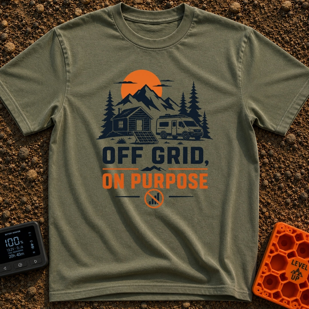 Unplugged On Purpose - T-Shirt in Moss - An illustration of a camper van and a small cabin nestled in a mountain...