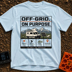 Off Grid On Purpose - T-Shirt in Chambray - The artwork shows a white camper van parked in a mountainous landscape,...