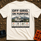 Off Grid On Purpose - T-Shirt in Ivory - The artwork shows a white camper van parked in a mountainous landscape,...