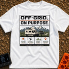 Off Grid On Purpose - T-Shirt in White - The artwork shows a white camper van parked in a mountainous landscape,...