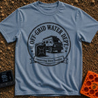 Free Range Water Dept - T-Shirt in Blue Jean - A black-and-white circular badge design featuring a classic camper van...