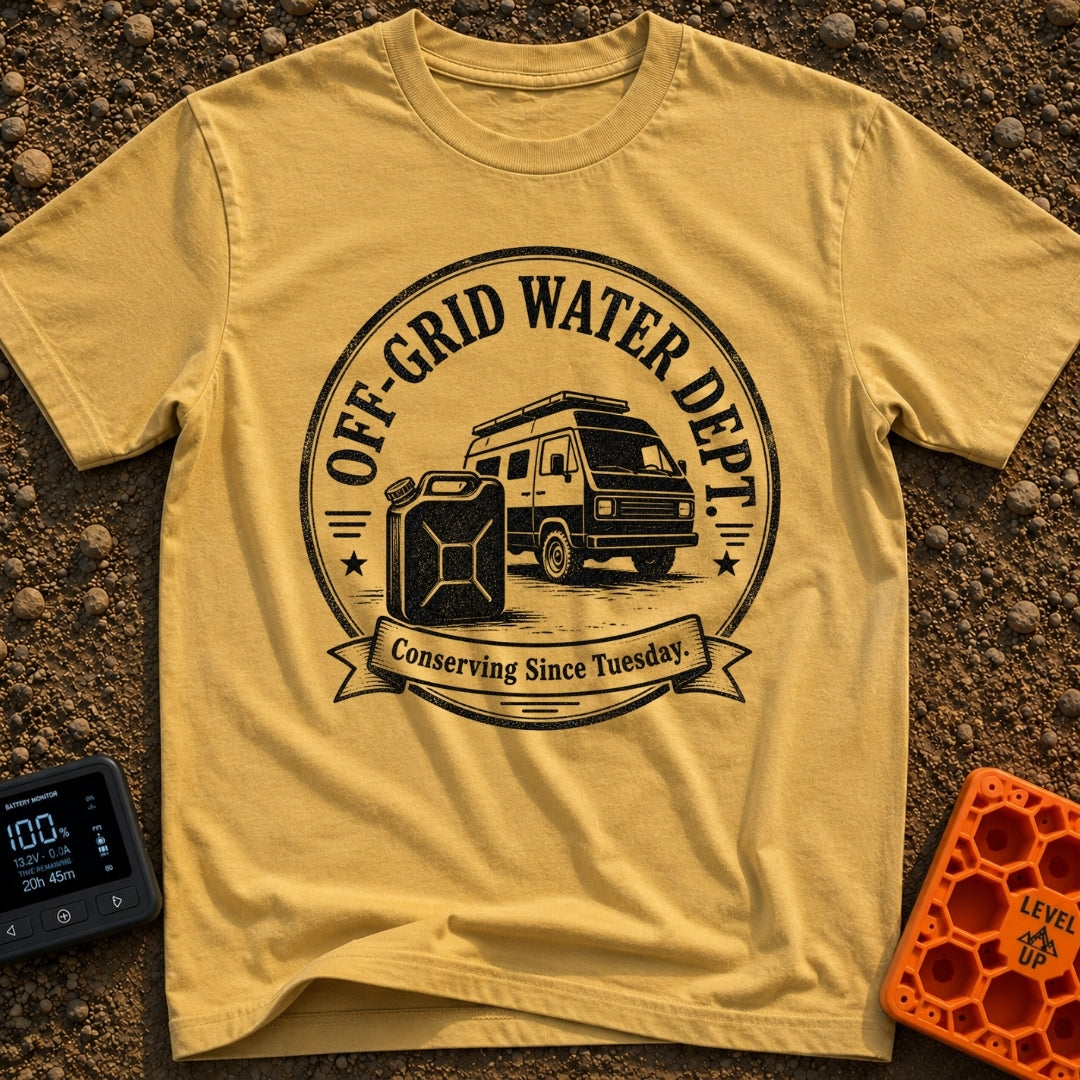 Free Range Water Dept - T-Shirt in Mustard - A black-and-white circular badge design featuring a classic camper van with...
