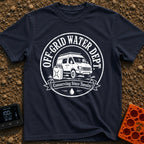 Free Range Water Dept - T-Shirt in Navy - A black-and-white circular badge design featuring a classic camper van with a...