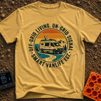 Signal On Wheels - T-Shirt in Mustard - A circular badge design featuring a white camper van with a large satellite dish...
