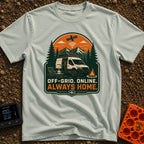Always Home Offline - T-Shirt in Bay - A camper van with a roof-mounted solar panel parked in a forest with mountains in...