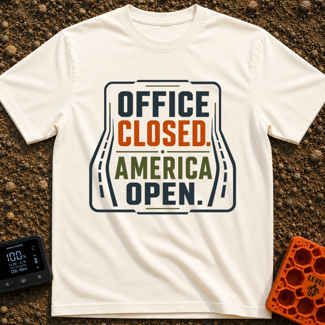 Out Of Office - T-Shirt in Ivory - A typographic design reading "OFFICE CLOSED. AMERICA OPEN." in bold block letters,...