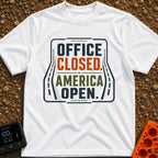 Out Of Office - T-Shirt in White - A typographic design reading "OFFICE CLOSED. AMERICA OPEN." in bold block letters,...