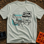 The New Corner Office - T-Shirt in Bay - A line-art illustration of an outdoor workspace set up on a beach in front of a...