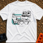 The New Corner Office - T-Shirt in White - A line-art illustration of an outdoor workspace set up on a beach in front of...